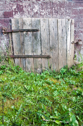 The wooden door to the cellar background