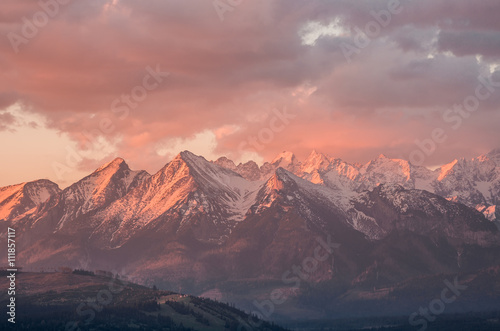 Cloudy Tatra mountains in the beautiful morning, covered with snow