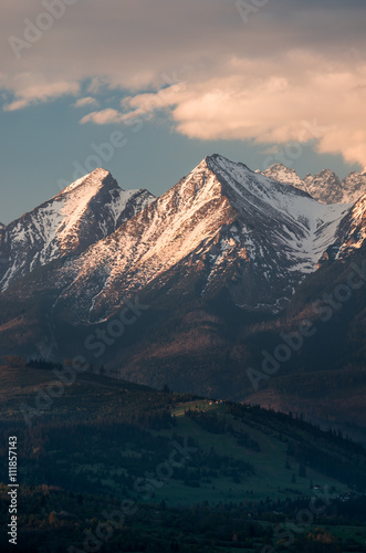 Cloudy Tatra mountains in the morning, covered with snow