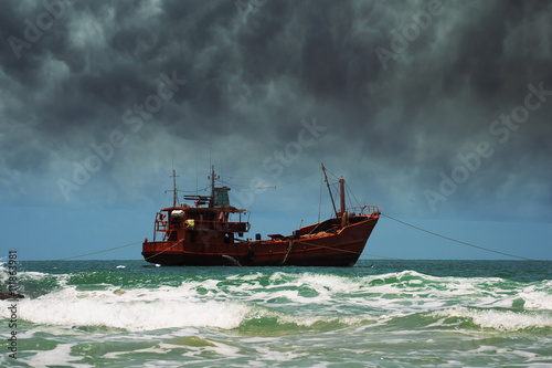 Fishing ship at sea during a storm