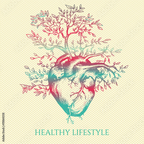 Anatomical human heart from which the tree grows symbol of life