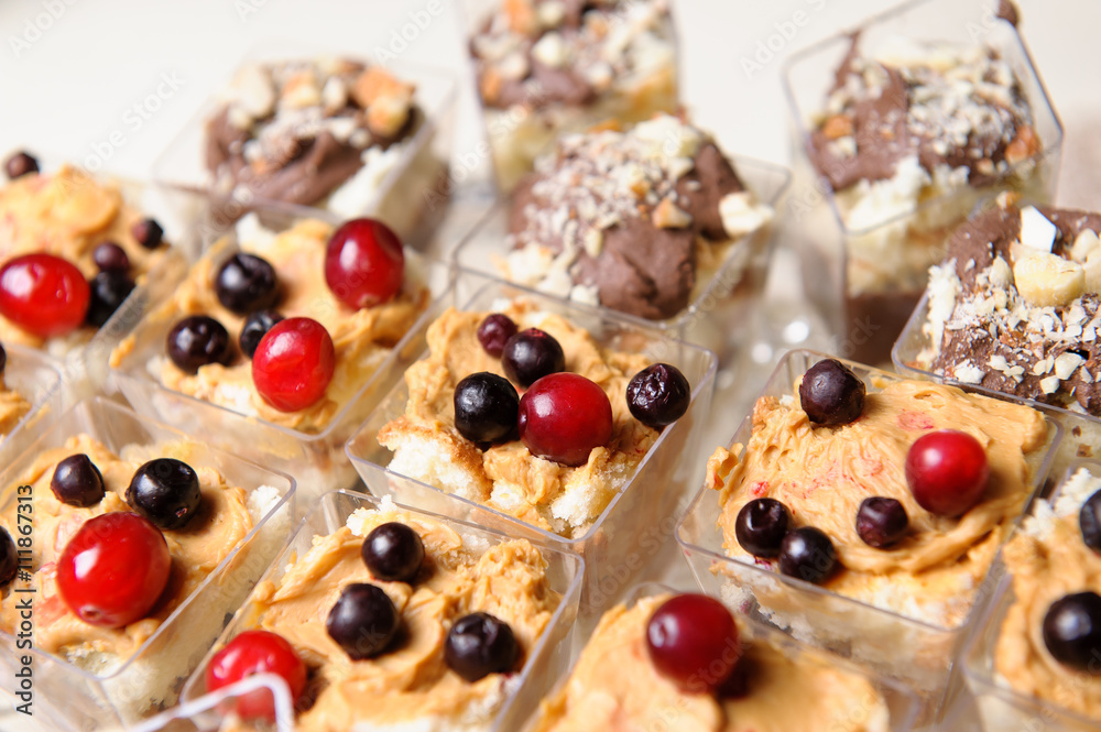 Delicious sweet buffet with cupcakes. Sweet holiday buffet with Delicious sweet buffet with cupcakes. Sweet holiday buffet with
