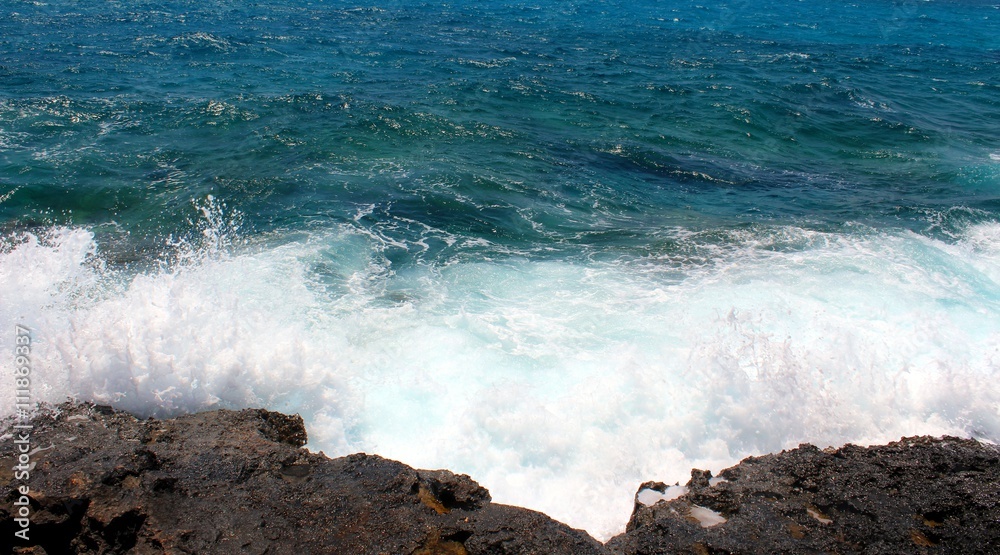 
Mediteranean Sea foam - wave hitting the shore