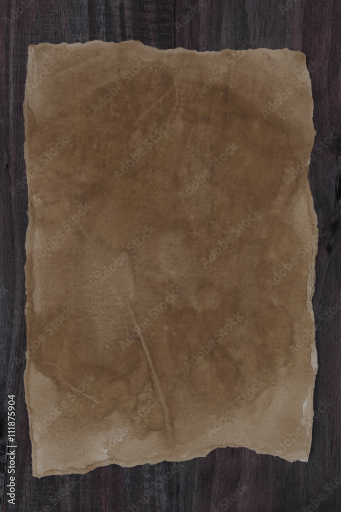 old paper on wooden background.