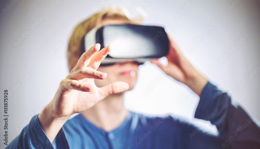 Man using a virtual reality headset Man using a virtual reality headset