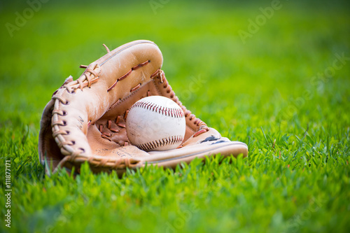 Baseball & Glove on Baseball Field