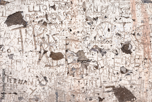 Inscription and names carved on a wall of a collapsed and abandoned farm house on the tableland La Merica on La Gomera photo