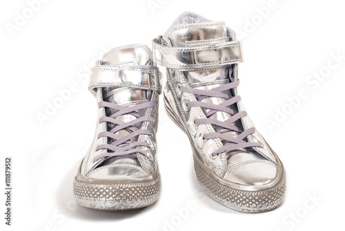 Pair of silver sneakers isolated