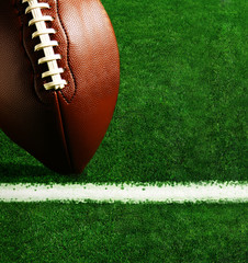 American football on football field background