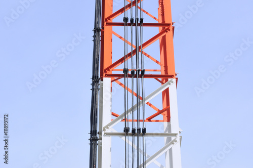 Parts of telecommunication tower with blue sky