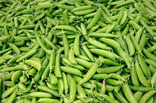 Fresh organic sugar snap peas at a local farmers market.