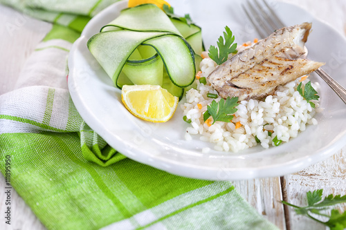 Grilled fillet of herring with rice