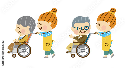 車いすを押す介護士　その2