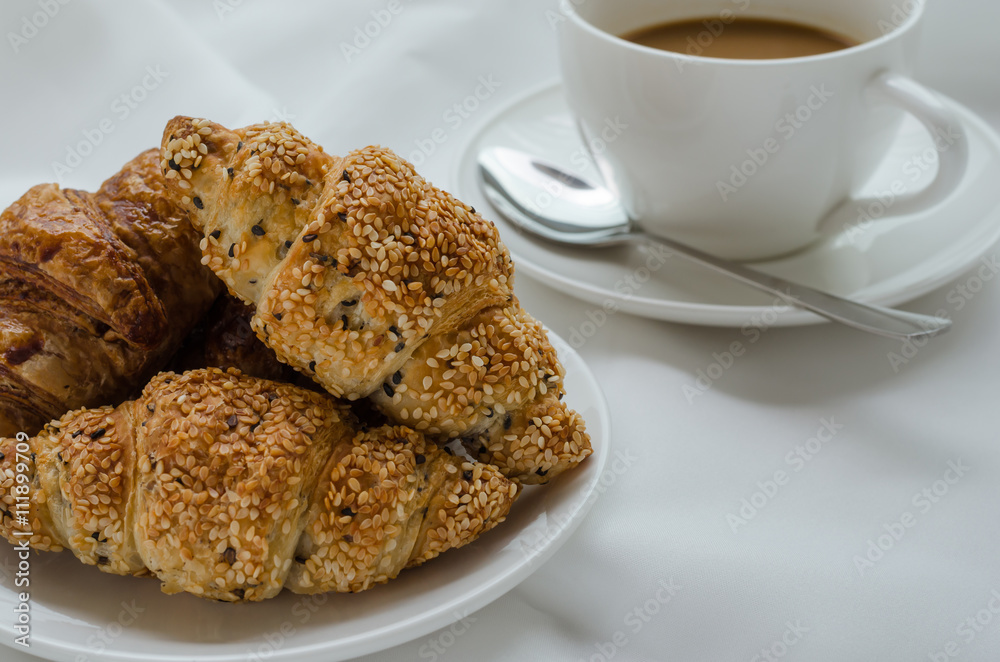 Sesame Croissants and Hot Coffee for Breakfast.