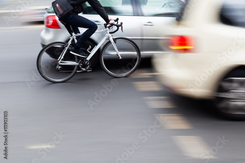 cyclist in city traffic © Christian Müller