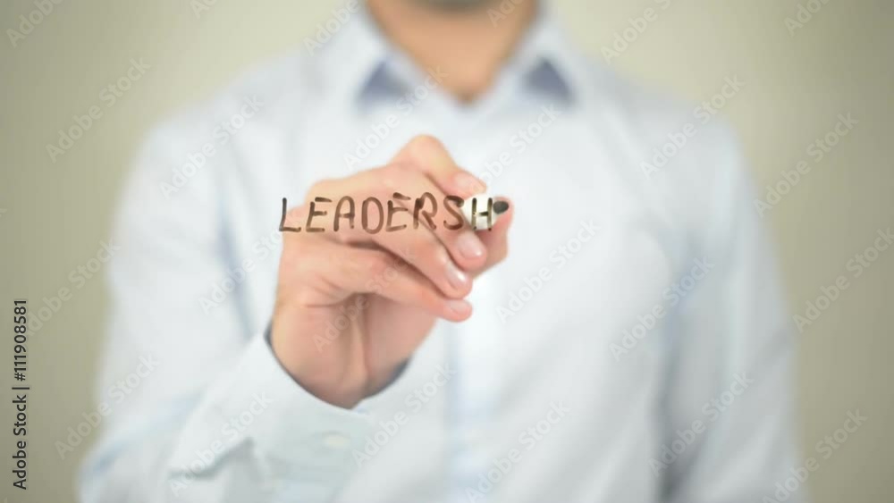 Leadership Is Action Not Position  ,  man writing on transparent wall