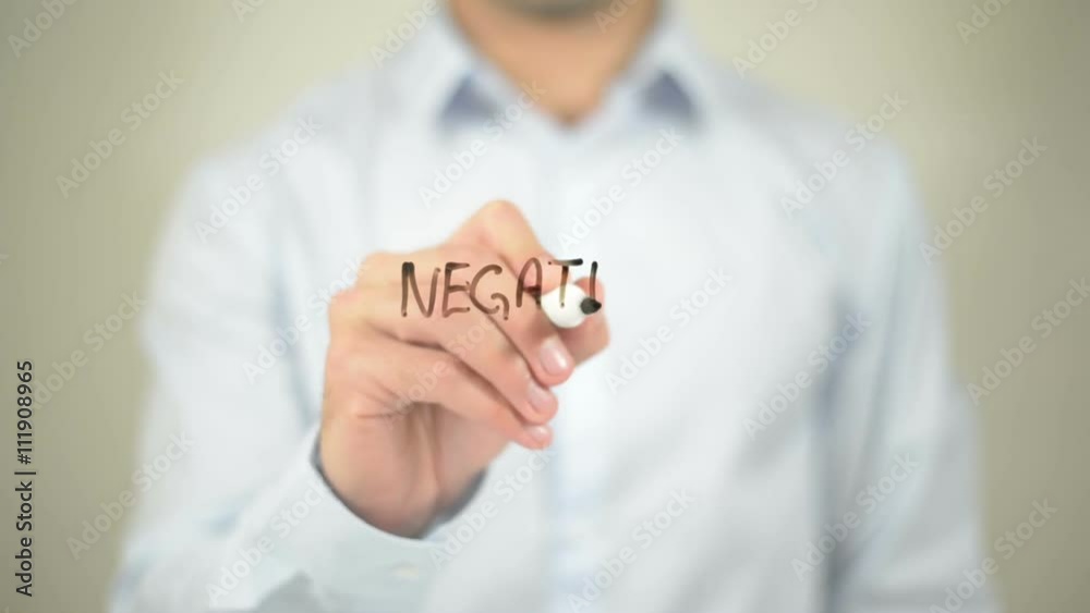 Negative , man writing on transparent wall Negative , man writing on transparent wall