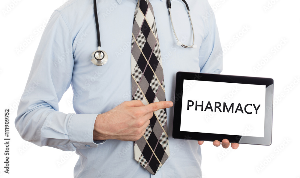 Doctor holding tablet - Pharmacy Doctor holding tablet - Pharmacy