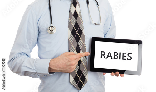 Doctor holding tablet - Rabies