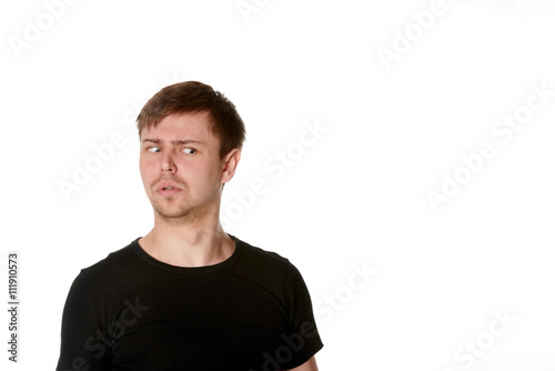 Suspicious young man with light beard, isolated on white, with space for text © Terence Mendoza