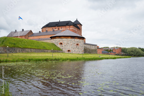 A view of the ancient fortress-jail Hameenlinna by Vanajavesi lake. Finland HAMEENLINNA, FINLAND - JUNE 21, 2014: