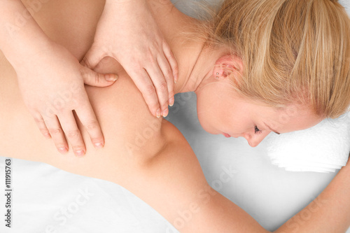 Young blonde woman in SPA