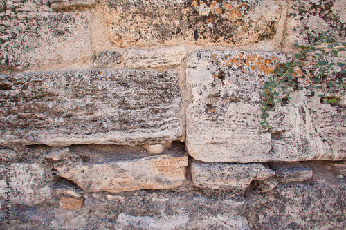 The texture of the stone wall. Limestone. Coquina. Background. Old walls