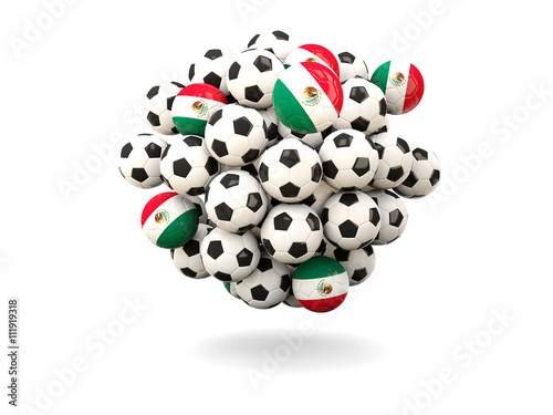 Pile of footballs with flag of mexico