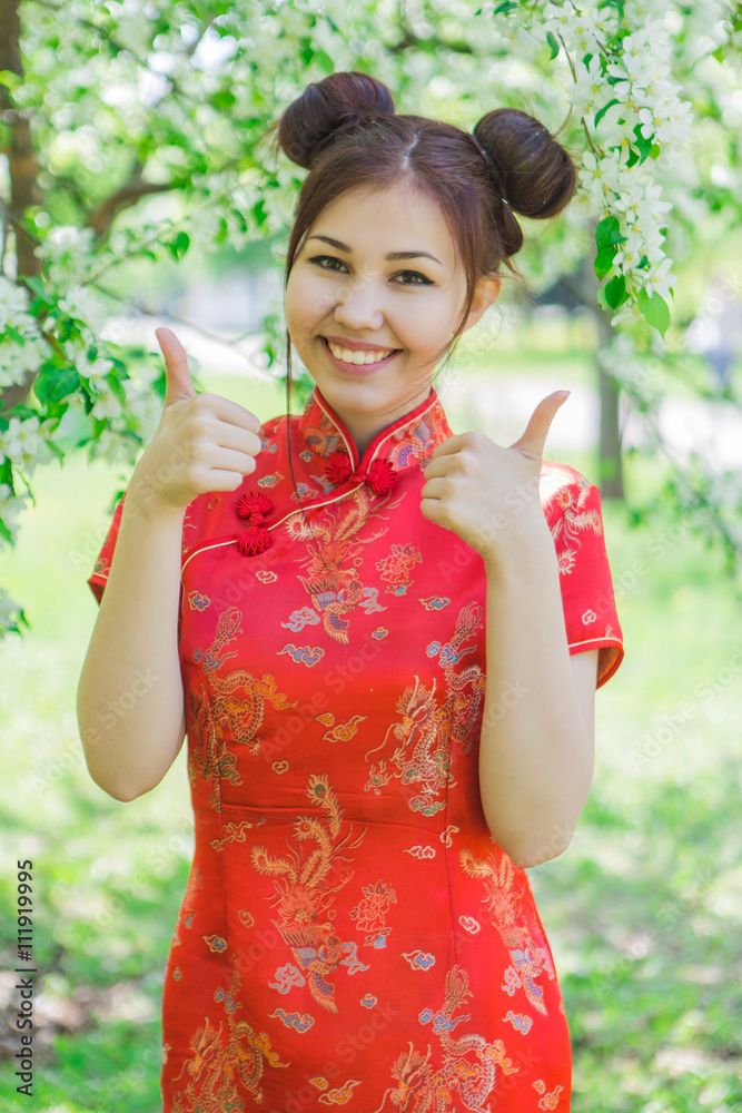Beautiful asian girl in traditional chinese red dress. Stock Photo | Adobe  Stock