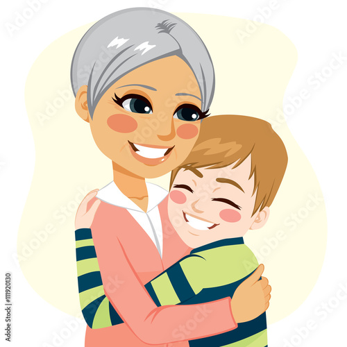 Cute young little boy hugging her dear grandmother