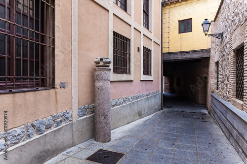 Typical alley in the old town of Toledo. Spain. photo