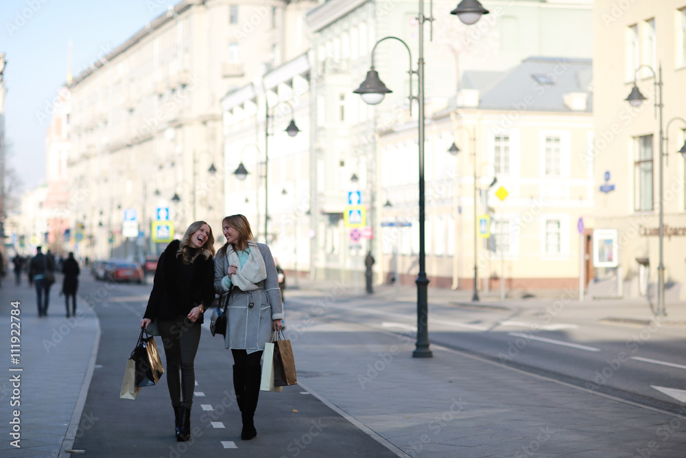 Two girlfriend, Autumn portrait of a walk in the city