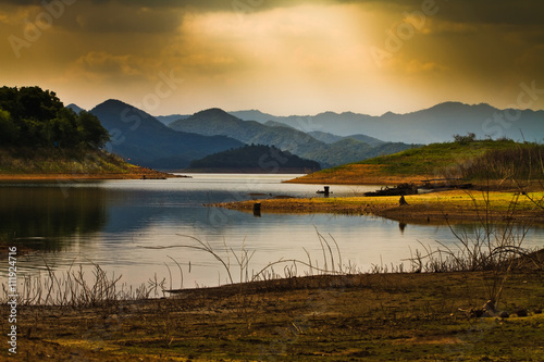 light rays on river mountain