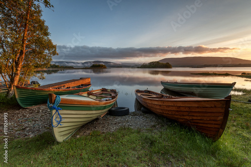Boats at the Lough Corrib, County Galway, Connemara, Ireland photo