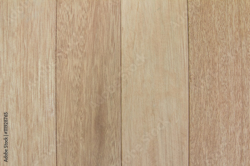 Brown parqueted floor, wooden texture with vertical planks.