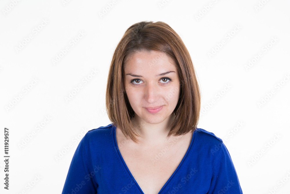 Smiling casual woman wearing blue top on white background Smiling casual woman wearing blue top on white background