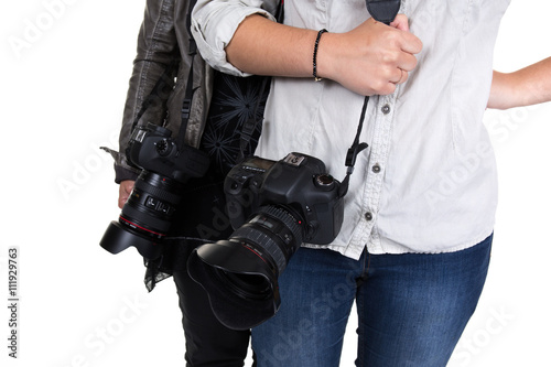 Photographers holding camera isolated on white background