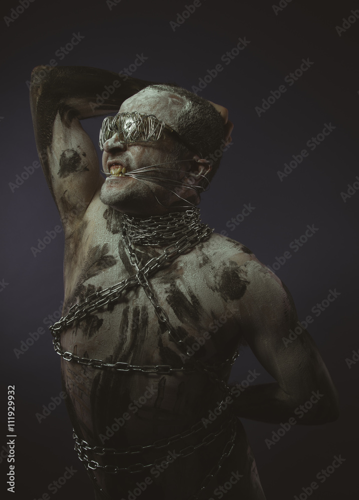 striper, bdsm, man with chains by the body and wire glasses, ski striper, bdsm, man with chains by the body and wire glasses, ski