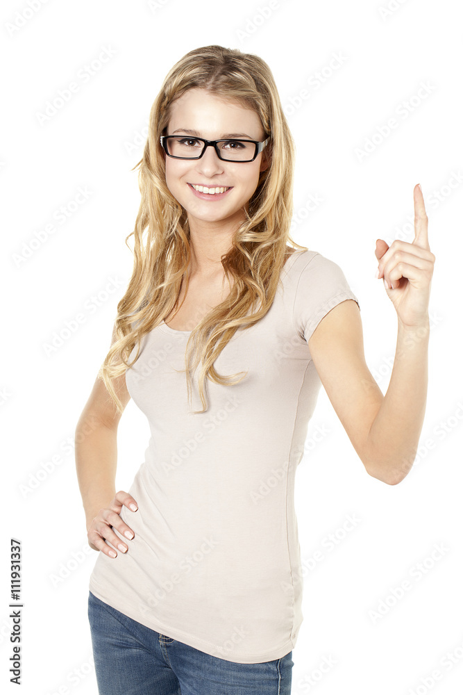 beautiful girl smiling while pointing up beautiful girl smiling while pointing up