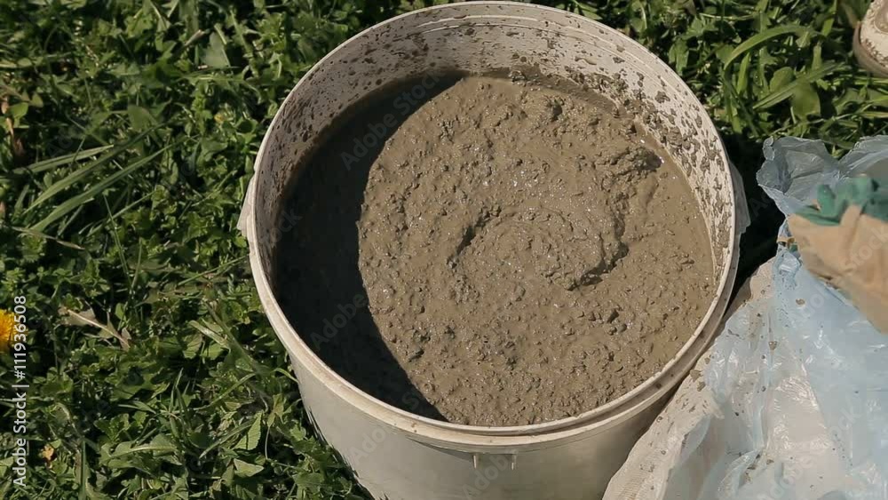 mixing cement in a bucket mixing cement in a bucket