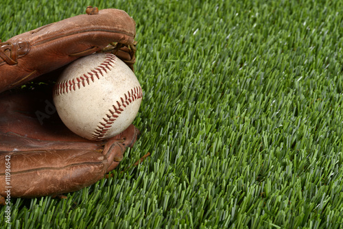 closeup baseball glove and ball