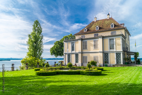 Schloss Arenenberg Sommerstimmung mit blauen Wolkenhimmel photo