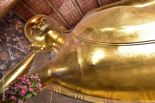 Wat Pho, one of the oldest and largest Buddhist temples in Bangkok is known as 'The Temple of the Reclining Buddha' thanks to the 15 meter high, 43 meter long Buddha image it shelters