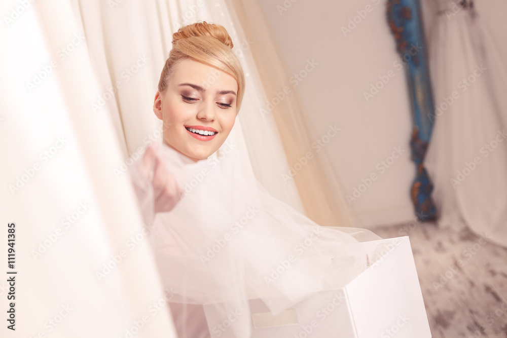 Attractive future bride is purchasing for wedding Attractive future bride is purchasing for wedding