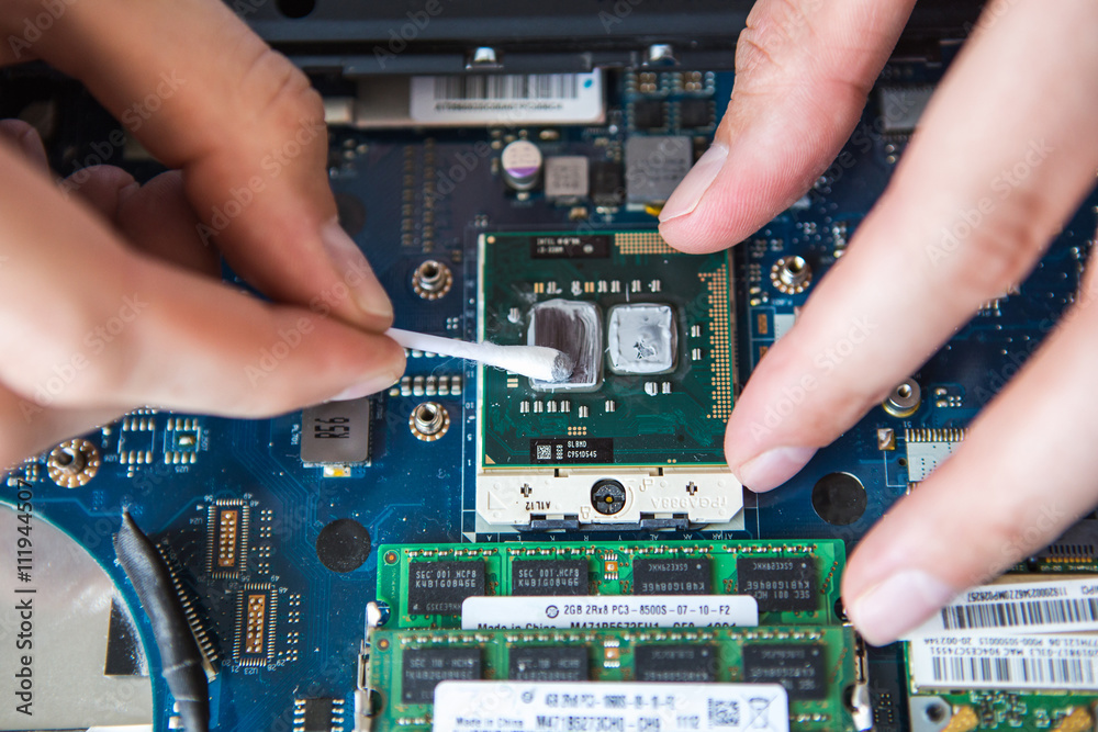 Computer literacy repair men hands, cooling the hot temperature of the laptop Computer literacy repair men hands, cooling the hot temperature of the laptop