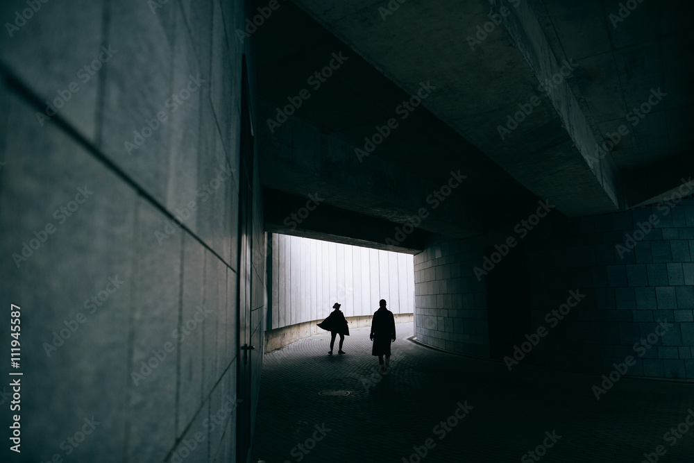 Silhouette people man and woman in hat Silhouette people man and woman in hat