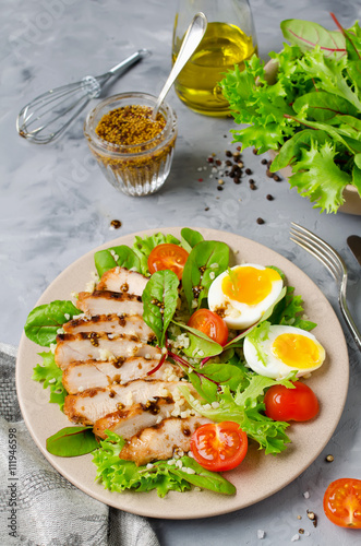 Chicken salad with leaf vegetables and cherry tomatoes