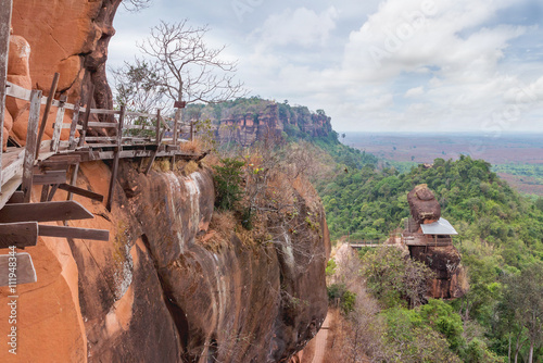 Unseen in thailand and amazing thailand,Phu tok mountain or Wat Jetiyakiree Viharn Temple with wooden trail round of the 7 floors mountain at Bueng Kan Province photo