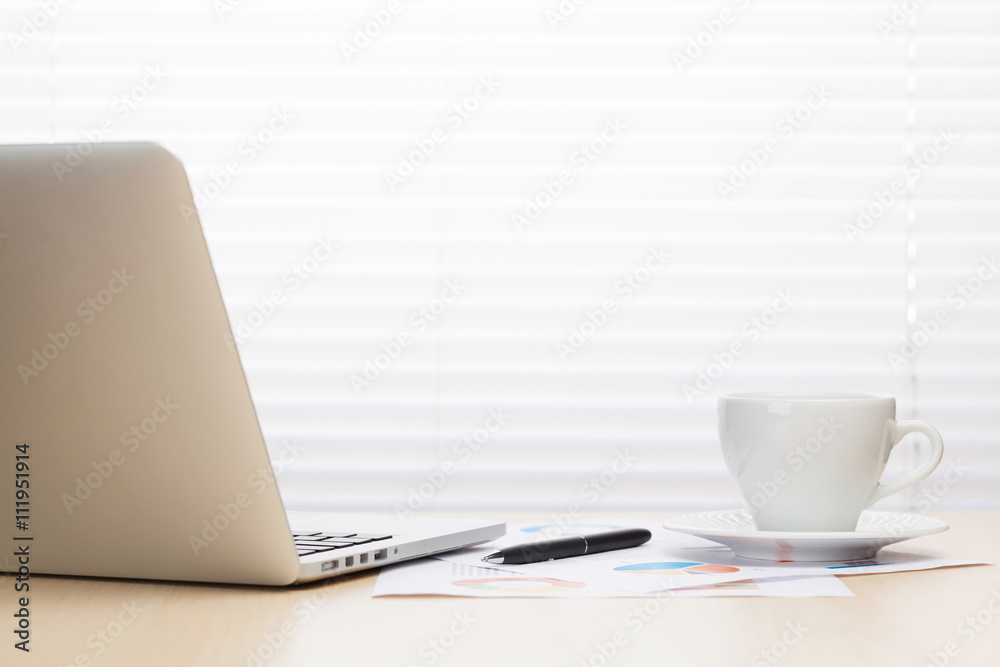Office workplace with with laptop and coffee Office workplace with with laptop and coffee