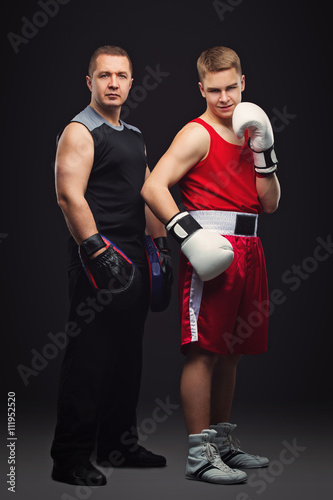 Young boxer with trainer © svetography